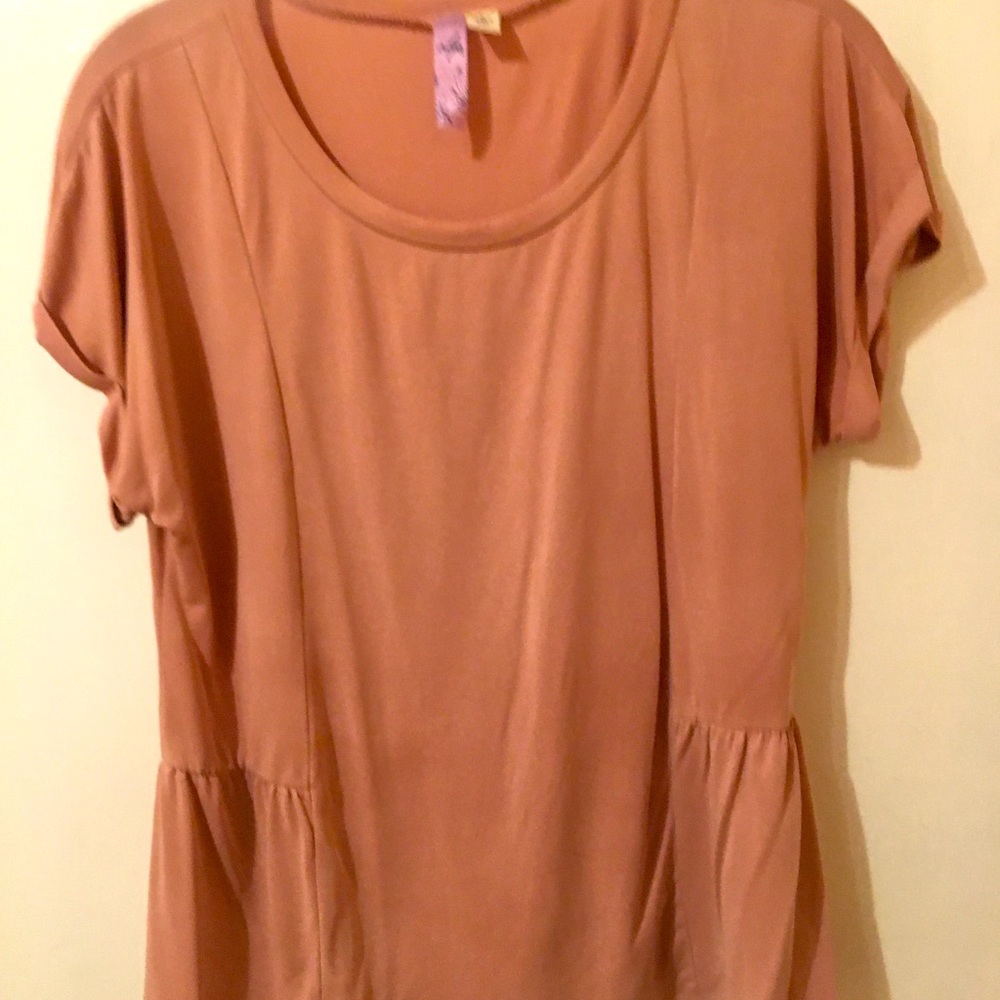 Blush peplum style blouse.